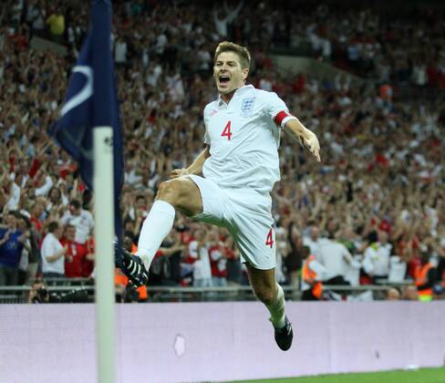 England s Steven Gerrard celebrates scoring his sides second goal International Friendly England v Hungary 11th August, 2010 EDITORIAL USE ONLY. No use with unauthorised audio, video, data, fixture lists, club league logos or live services. Online in-match use limited to 120 images, no video emulation. No use in betting, games or single club league player publications. o0 Jubel Freude
