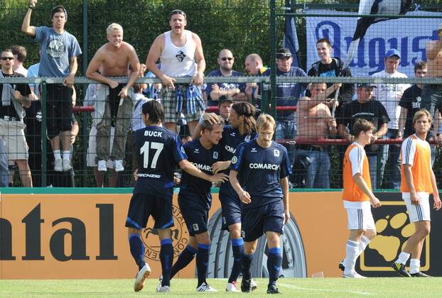 14.08.2010,Fussball, DFB-POKAL, 1. RUNDE, Saison 2010 2011, TSV 1860 MÜNCHEN 1 - 2 Jubel TSV 1860 München, v.L: Stefan Buck, Stefan Aigner, Djordje Rakic, Daniel Bierofka (TSV 1860 München) Totale o0 Jubel Freude Fans Zuschauer