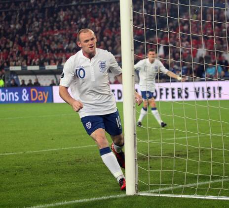 England s Wayne Rooney celebrates scoring his sides opening goal European Championship Qualifying Group G Switzerland v England 7th September, 2010 EDITORIAL USE ONLY. No use with unauthorised audio, video, data, fixture lists, club league logos or live services. Online in-match use limited to 120 images, no video emulation. No use in betting, games or single club league player publications.