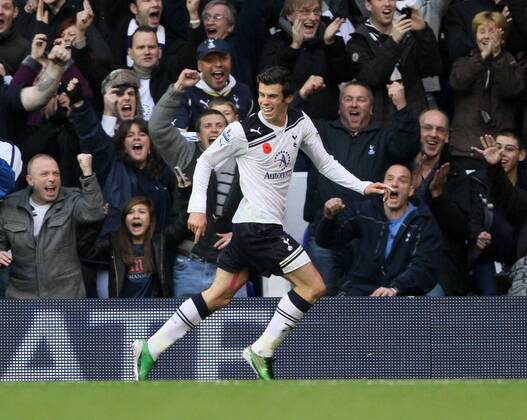 Tottenhams Gareth Bale celebrates scoring his sides opening goal - Barclays Premier League - Tottenham Hotspur - Blackburn Rovers - EDITORIAL USE ONLY. No use with unauthorised audio, video, data, fixture lists, club league logos or live services. Online in-match use limited to 120 images, no video emulation. No use in betting, games or single club league player publications.