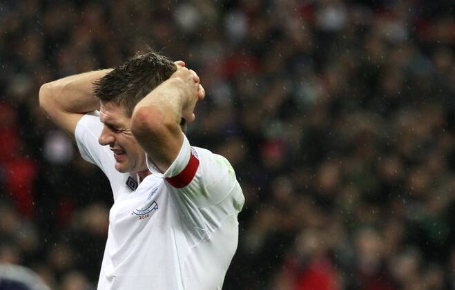 Englands Steven Gerrard looks on dejected - England (white) vs. France (blue) 1:2 EDITORIAL USE ONLY. No use with unauthorised audio, video, data, fixture lists, club league logos or live services. Online in-match use limited to 120 images, no video emulation. No use in betting, games or single club league player publications.