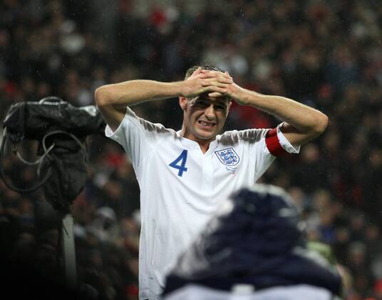 Englands Steven Gerrard looks on dejected - England (white) vs. France (blue) 1:2 EDITORIAL USE ONLY. No use with unauthorised audio, video, data, fixture lists, club league logos or live services. Online in-match use limited to 120 images, no video emulation. No use in betting, games or single club league player publications.