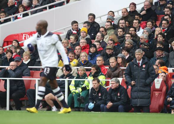 Arsenal FC London - Tottenham Hotspur - Arsene Wenger (R), Arsenal coach, watches William Gallas (Tottenham).