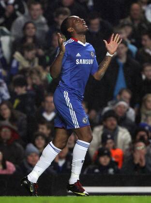 Chelseas Didier Drogba looks on dejected - Barclays Premier League, FC Chelsea London (blue) v Bolton Wanderers (white) 29th December, 2010 EDITORIAL USE ONLY. No use with unauthorised audio, video, data, fixture lists, club league logos or live services. Online in-match use limited to 120 images, no video emulation. No use in betting, games or single club league player publications.