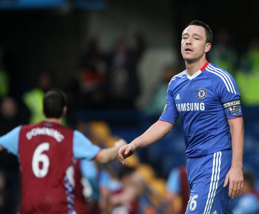 Chelseas John Terry looks on dejected after conceding late on - Barclays Premier League, FC Chelsea (blue) vs. Aston Villa (red) in London 2nd January, 2011 EDITORIAL USE ONLY. No use with unauthorised audio, video, data, fixture lists, club league logos or live services. Online in-match use limited to 120 images, no video emulation. No use in betting, games or single club league player publications.