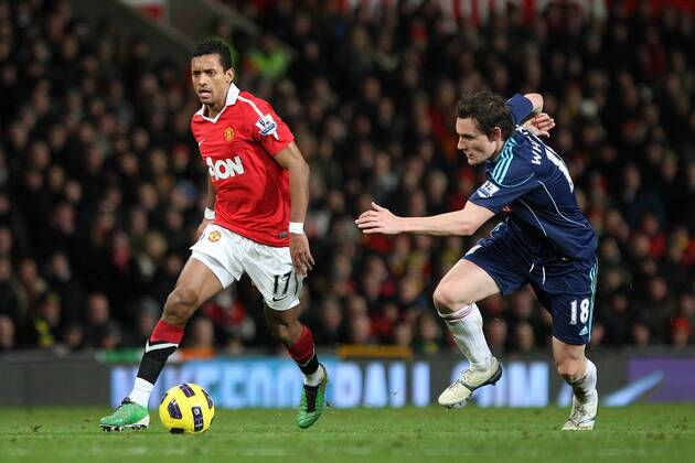 Football - Premier League - Manchester United vs. Stoke City Nani of Manchester United (L) passes Stoke s Dean Whitehead at Old Trafford