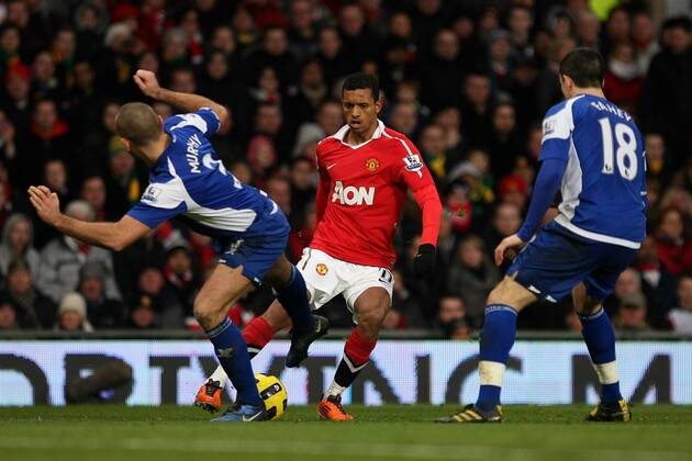 Football - Premier League - Manchester United vs. Birmingham City - David Murphy (L) and Keith Fahey of Birmingham City try to stop Nani of Manchester United progressing at Old Trafford