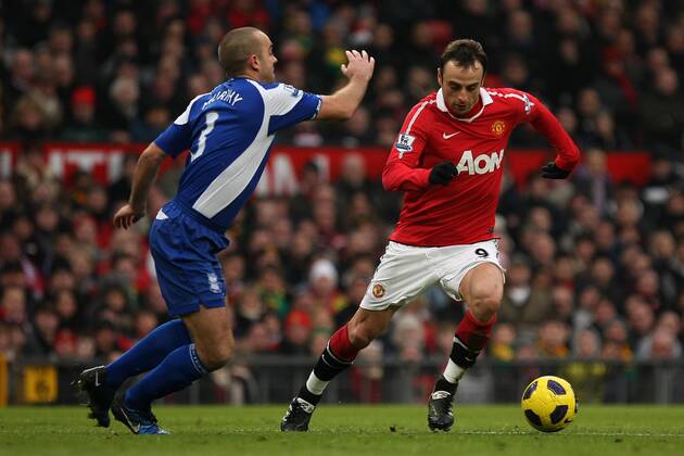 Football - Premier League - Manchester United vs. Birmingham City Dimitar Berbatov of Manchester United (R) in action against David Murphy of Birmingham City at Old Trafford