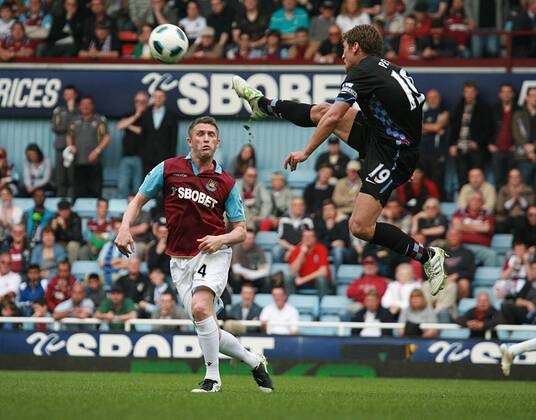 Football - Premier League - West Ham United vs. Aston Villa Danny Gabbidon Of West Ham and Stiliyan of Aston Villa at Upton Park, London