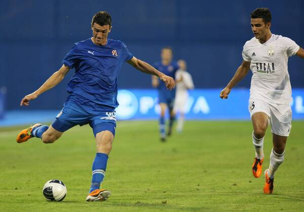 Zagreb, 13.07.2011. 2nd qualifying round UEFA Champions League - First Leg GNK Dinamo Zagreb (blue) - Neftci Baku PFK (white) Ivan Krstanovic (b) and Ruslan Adishov (w)