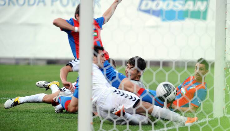 Champions League 2. qualification match Viktoria Pilsen against Pyunik Yerevan on July 19, 2011 in Pilsen, Czech Republic. Pictured Varazdat Haroyan, Milan Petrzela, Karen Israelyan. (CTKxPhoto PavelxRakusan) CTKPhoto8201107190367401