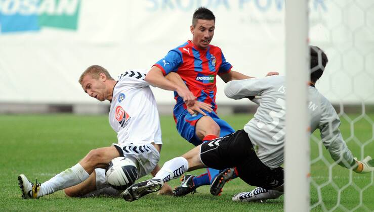 Champions League 2. qualification match Viktoria Pilsen against Pyunik Yerevan on July 19, 2011 in Pilsen, Czech Republic. Pictured Varazdat Haroyan, Milan Petrzela, Karen Israelyan. (CTKxPhoto PavelxRakusan) CTKPhoto201107190367501