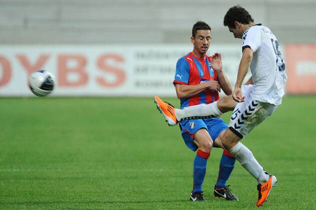 Champions League 2. qualification match Viktoria Pilsen against Pyunik Yerevan on July 19, 2011 in Pilsen, Czech Republic. Pictured Artur Yuspashyan, Milan Petrzela. (CTKxPhoto PavelxRakusan) CTKPhoto201107190368901