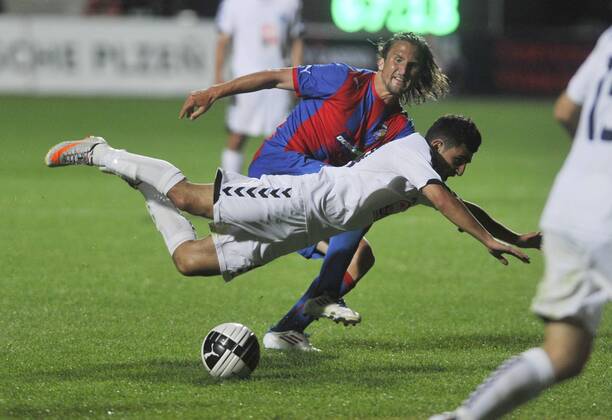Champions League 2. qualification match Viktoria Pilsen against Pyunik Yerevan on July 19, 2011 in Pilsen, Czech Republic. Pictured Petr Jiracek, Gagik Pogosjan. (CTKxPhoto PetrxEret) CTKPhoto4201107190989401