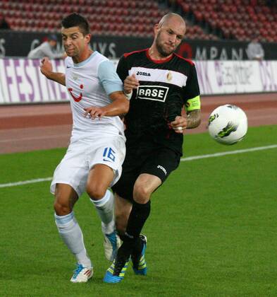 03.07.2011 Fussball 3. Qualifikationsrunde UEFA Champions League FC Zürich - Standard Lüttich , Stadion Letzigrund. Bild zeigt Philippe Koch FC Zürich li.gegen Jelle Van Aktion Damme Aktion Zweikampf