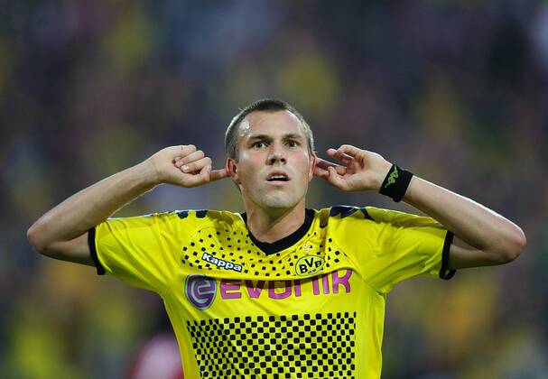 Fussball Bundesliga Saison 2011 2012 1. Spieltag Borussia Dortmund - Hamburger SV V.l.: Kevin GROSSKREUTZ (BVB) jubelt nach seinem Tor zum 1:0.