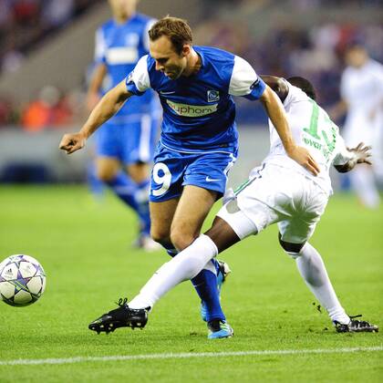 Thomas Buffel of KRC Genk (L) Talb Twatha of Maccabi Haifa KRC Genk v Maccabi Haifa UEFA Champions League 2011 2012 xVIxJackxJacobsxIVx 342028
