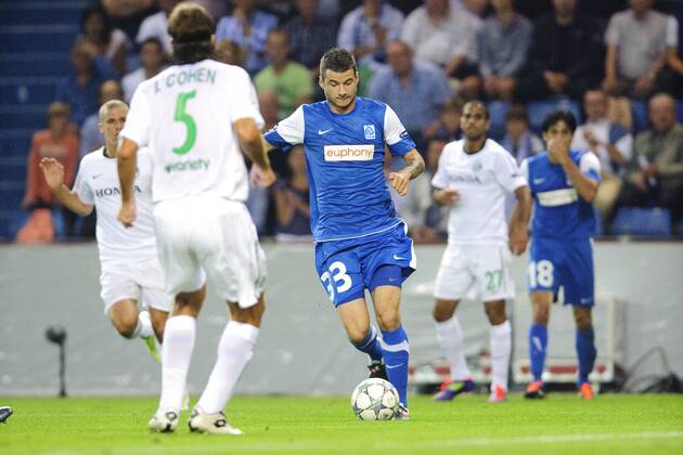 Itzhak Cohen of Maccabi Haifa (L) Daniel Pudil of KRC Genk (c) Eyal Mashumar of Maccabi Haifa KRC Genk v Maccabi Haifa UEFA Champions League 2011 2012 xVIxJackxJacobsxIVx 342029