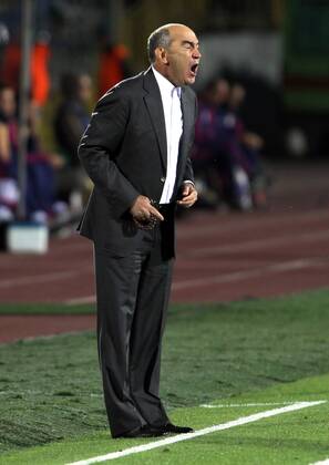 ITAR-TASS: KAZAN, RUSSIA. AUGUST 24, 2011. Kurban Berdyev, head coach of Russian FC Rubin Kazan, is pictured during an UEFA Champions League game against French FC Lyon at Central Stadium in the city of Kazan.  RE0ECA45