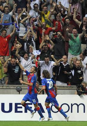 Pilsen players Marek Bakos (left) and Petr Jiracek celebrate first goal during second leg play-off Champions League soccer match FC Viktoria Plzen vs FC Copenhagen in Prague, Czech Republic, Wednesday, Aug. 24, 2011. (CTKxPhoto MichalxKamaryt)  CTKPhoto750201108240994901