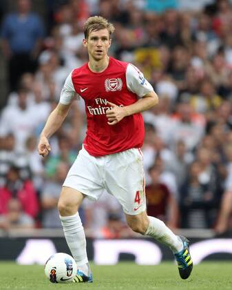 Arsenals Per Mertesacker in action Barclays Premier League Arsenal FC v Swansea City 10th September, 2011 EDITORIAL USE ONLY. No use with unauthorised audio, video, data, fixture lists, club league logos or live services. Online in-match use limited to 120 images, no video emulation. No use in betting, games or single club league player publications.