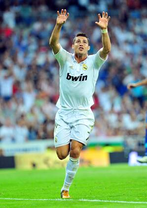 Real Madrid s Cristiano Ronaldo celebrates for goal during the Spanish first division soccer match against Getafe at Santiago Bernabeu stadium in Madrid, Spain, Sept. 10, 2011. Real Madrid won 4-2. (Xinhua Chen Haitong) (bxf) SPAIN-MADRID-SOCCER-FIRST DIVISION MATCH-REAL MADRID VS GETAFE