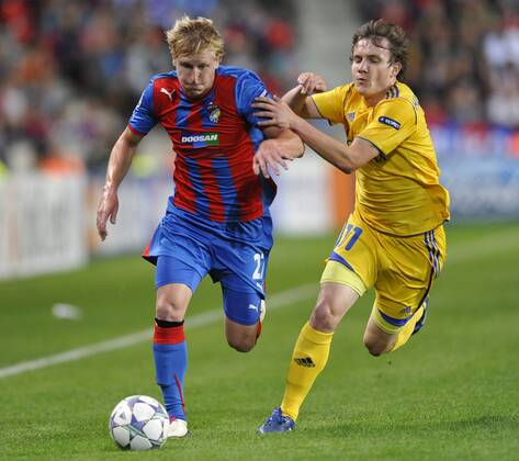 Mikhail Gordeichuk from BATE Borisov, left, and Frantisek Rajtoral from FC Viktoria Plzen during the Champions League group H soccer match in Prague, Tuesday, Sep. 13, 2011. (CTKxPhoto MichalxDolezal)  CTKPhoto79201109131005001