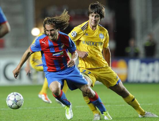 Aliaksandr Pavlov from BATE Borisov, left, and Frantisek Rajtoral from FC Viktoria Plzen during the Champions League group H soccer match in Prague, Tuesday, Sep. 13, 2011. (CTKxPhoto MichalxKamaryt)  CTKPhoto7201109131002701