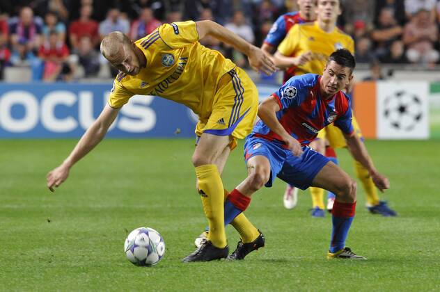 Mikhail Gordeichuk from BATE Borisov, right, and Milan Petrzela from FC Viktoria Plzen, left, during the Champions League group H soccer match in Prague, Tuesday, Sep. 13, 2011. (CTKxPhoto MichalxDolezal)  CTKPhoto83201109131015401