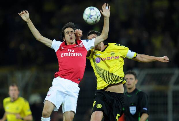 FUSSBALL CHAMPIONS LEAGUE SAISON 2011 2012, Borussia Dortmund (BVB) - Arsenal FC London 13.09.2011; Yossi BENAYOUN (li, Arsenal) gegen Sebastian KEHL (re, Dortmund)  BVB