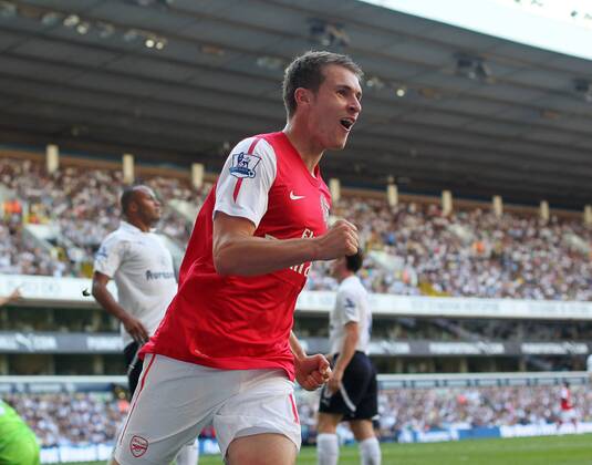 Arsenals Aaron Ramsey celebrates scoring his sides opening goal Barclays Premier League - Tottenham Hotspur vs. Arsenal FC London - 2nd October, 2011 EDITORIAL USE ONLY. No use with unauthorised audio, video, data, fixture lists, club league logos or live services. Online in-match use limited to 120 images, no video emulation. No use in betting, games or single club league player publications.