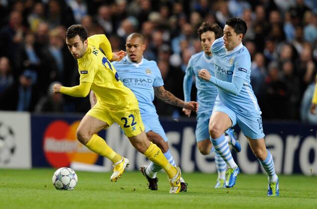 Giuseppe Rossi of Villarreal runs clear of Samir Nasri of Manchester City UEFA Champions League Group A Manchester City v Villarreal 18th October, 2011 EDITORIAL USE ONLY. No use with unauthorised audio, video, data, fixture lists, club league logos or live services. Online in-match use limited to 120 images, no video emulation. No use in betting, games or single club league player publications.