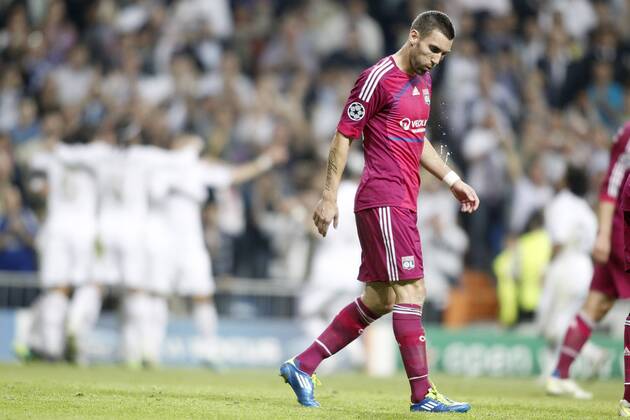 Olympique Lyonnais Anthony Revelliere spits dejected during UEFA Champions League match. October 18, 2011.  (201110186606)