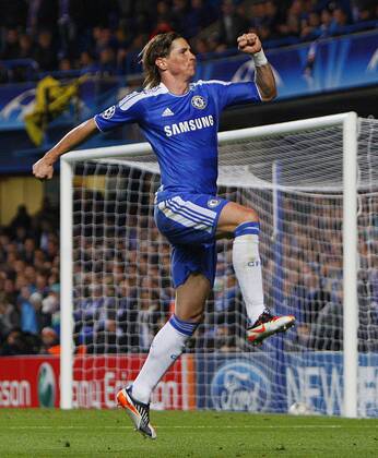 Fernando Torres of Chelsea celebrates scoring his side s third goal during the Champions League match between Chelsea FC London - KRC Genk 2011 EDITORIAL USE ONLY. No use with unauthorised audio, video, data, fixture lists, club league logos or live services. Online in-match use limited to 120 images, no video emulation. No use in betting, games or single club league player publications.