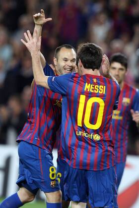 FC Barcelona - FC Viktoria Plzen, Barcelona s Andres Iniesta celebrates scoring first goal with team-mate Lionel Messi during the Champions group H match xTatixQuinonesx  ActionPlus20198875 Content restricted for UK based newspaper