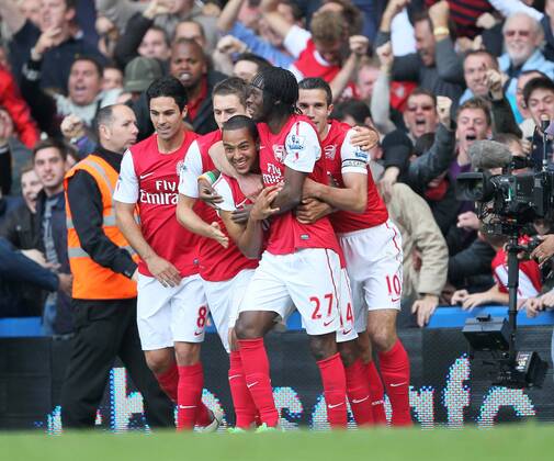 Arsenals Theo Walcott celebrates scoring his sides third goal Barclays Premier League FC Chelsea London vs FC Arsenal London 29th October, 2011 EDITORIAL USE ONLY. No use with unauthorised audio, video, data, fixture lists, club league logos or live services. Online in-match use limited to 120 images, no video emulation. No use in betting, games or single club league player publications.