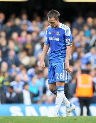 Chelseas John Terry looks on dejected after his mistake led to the winning goal Barclays Premier League FC Chelsea London vs FC Arsenal London 29th October, 2011 EDITORIAL USE ONLY. No use with unauthorised audio, video, data, fixture lists, club league logos or live services. Online in-match use limited to 120 images, no video emulation. No use in betting, games or single club league player publications.