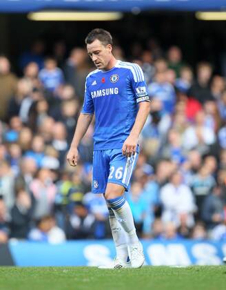 Chelseas John Terry looks on dejected after his mistake led to the winning goal Barclays Premier League FC Chelsea London vs FC Arsenal London 29th October, 2011 EDITORIAL USE ONLY. No use with unauthorised audio, video, data, fixture lists, club league logos or live services. Online in-match use limited to 120 images, no video emulation. No use in betting, games or single club league player publications.