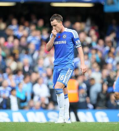Chelseas John Terry looks on dejected after his mistake led to the winning goal Barclays Premier League FC Chelsea London vs FC Arsenal London 29th October, 2011 EDITORIAL USE ONLY. No use with unauthorised audio, video, data, fixture lists, club league logos or live services. Online in-match use limited to 120 images, no video emulation. No use in betting, games or single club league player publications.
