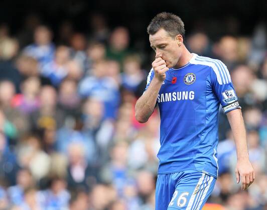 Chelseas John Terry looks on dejected after his mistake led to the winning goal Barclays Premier League FC Chelsea London vs FC Arsenal London 29th October, 2011 EDITORIAL USE ONLY. No use with unauthorised audio, video, data, fixture lists, club league logos or live services. Online in-match use limited to 120 images, no video emulation. No use in betting, games or single club league player publications.