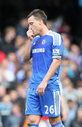 Chelseas John Terry looks on dejected after his mistake led to the winning goal Barclays Premier League FC Chelsea London vs FC Arsenal London 29th October, 2011 EDITORIAL USE ONLY. No use with unauthorised audio, video, data, fixture lists, club league logos or live services. Online in-match use limited to 120 images, no video emulation. No use in betting, games or single club league player publications.