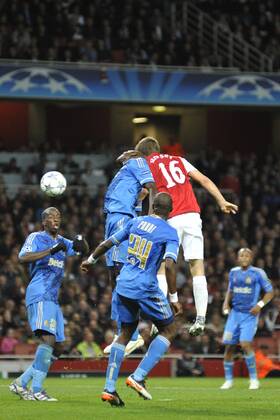 01.11.2011, London, England. Arsenal s Aaron Ramsey heads the ball during the UEFA Champions League Group F football match between Arsenal and Olympique Marseille from France, played at The Emirates Stadium. Mandatory credit: ActionPlus xStevexButlerx  ActionPlus11217896 Content restricted for UK based newspaper
