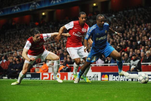 Arsenal FC London - Olympique Marseille, Andre Ayew - Marseille Carl Jenkinson and Theo Walcott - Arsenal 