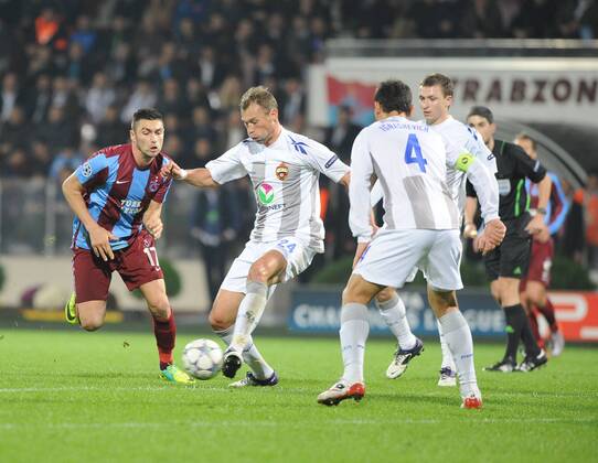 UEFA Champions League Group B soccer match between Trabzonspor and CSKA Moscow at Avni Aker stadium in Trabzon,Turkey, November 02, 2011. Pictured: Burak Yilmaz of Trabzonspor and Vasili Berezutski (R) of CSKA Moscow. 