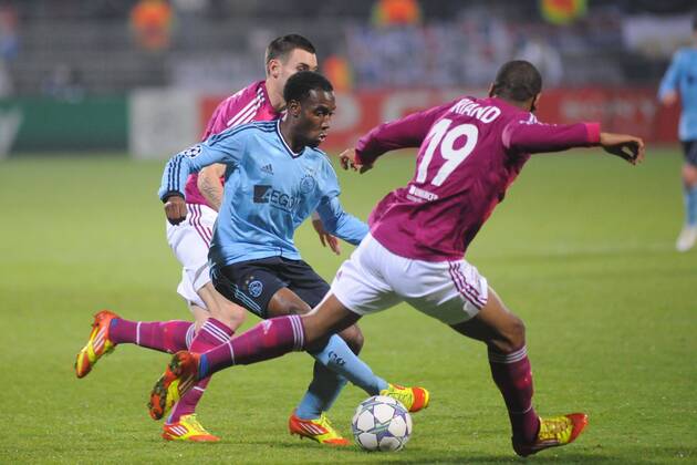 Jimmy Briand (Lyon) - Vurnon Anita (Ajax) Football: Olympique Lyon (OL) - Ajax Amsterdam. Champions League - 22.11.2011 - 