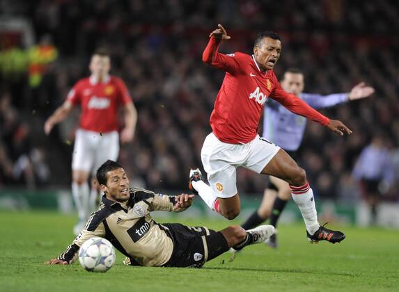 Nani of Manchester United brought down by Ezequiel Garay of SL Benfica UEFA Champions League Group C, Manchester United (ManU) vs Benfica SL Lisbon. 22nd November, 2011 EDITORIAL USE ONLY. No use with unauthorised audio, video, data, fixture lists, club league logos or live services. Online in-match use limited to 120 images, no video emulation. No use in betting, games or single club league player publications.