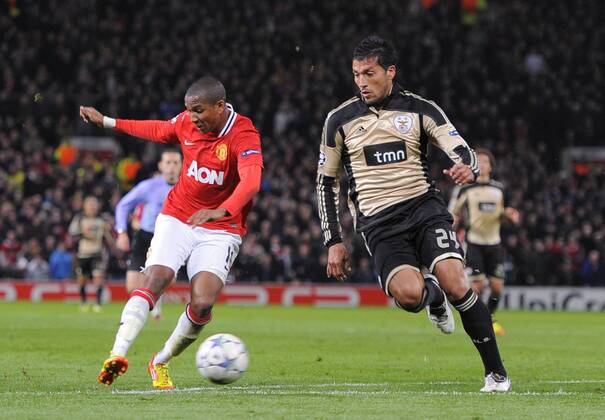 Ashley Young of Manchester United shoots UEFA Champions League Group C, Manchester United (ManU) vs Benfica SL Lisbon. 22nd November, 2011 EDITORIAL USE ONLY. No use with unauthorised audio, video, data, fixture lists, club league logos or live services. Online in-match use limited to 120 images, no video emulation. No use in betting, games or single club league player publications.
