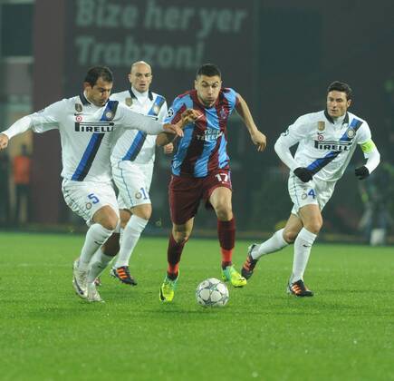 UEFA Champions League Group B soccer match between Trabzonspor AS and Inter Milan at Avni Aker stadium in Trabzon, Turkey, 22.11.2011. Pictured: Dejan Stankovic (L) and Javier Zanetti ( R) of Inter and Burak Yilmaz of Trabzonspor. 