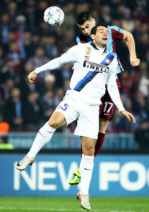 UEFA Champions League Group B soccer match between Trabzonspor AS and Inter Milan at Avni Aker stadium in Trabzon, Turkey, 22.11.2011. Pictured: Burak Yilmaz ( back ) of Trabzonspor and Dejan Stankovic of Inter. 