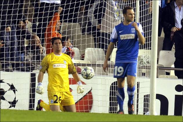 Laszlo Koteles of KRC Genk and Thomas Buffel of KRC Genk Football: Valencia CF - KRC Genk (RC) - Champions League - 23.11.2011 - xPhotoNewsx 